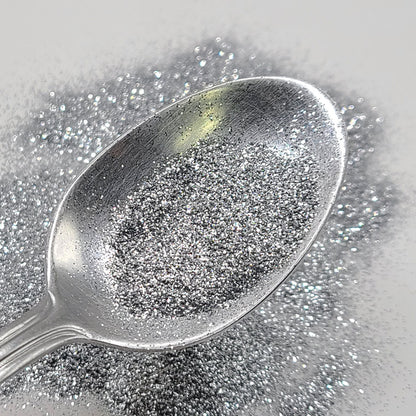 Silver glitter in extra fine .008 hex cut. 